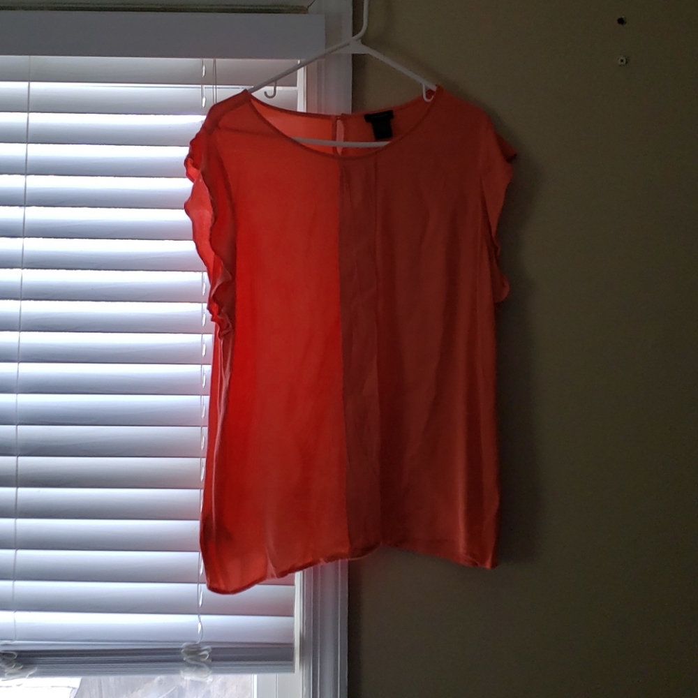 Melon colored blouse